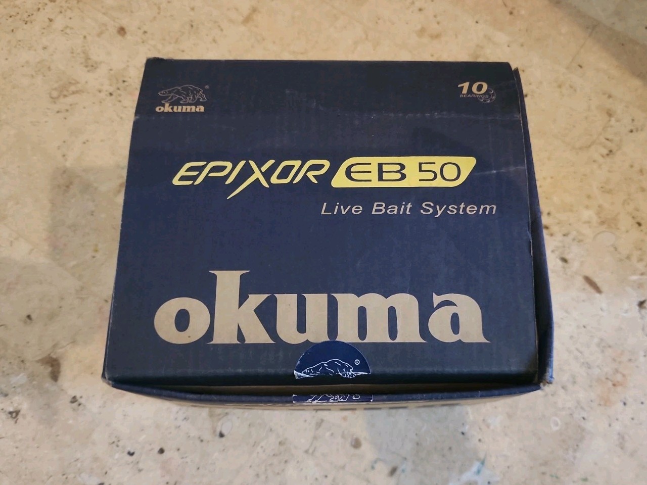 Okuma EPIXOR EB50 Live Bait System Reel In Box With Paper Work