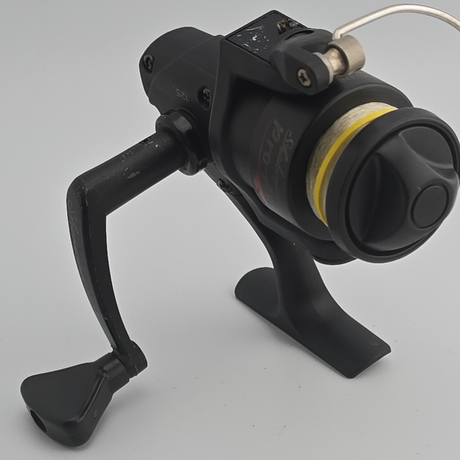 Shakespeare Pro Am 125 Ultra lite Spinning Fishing Reel Black 4:8:1 Gear Ratio