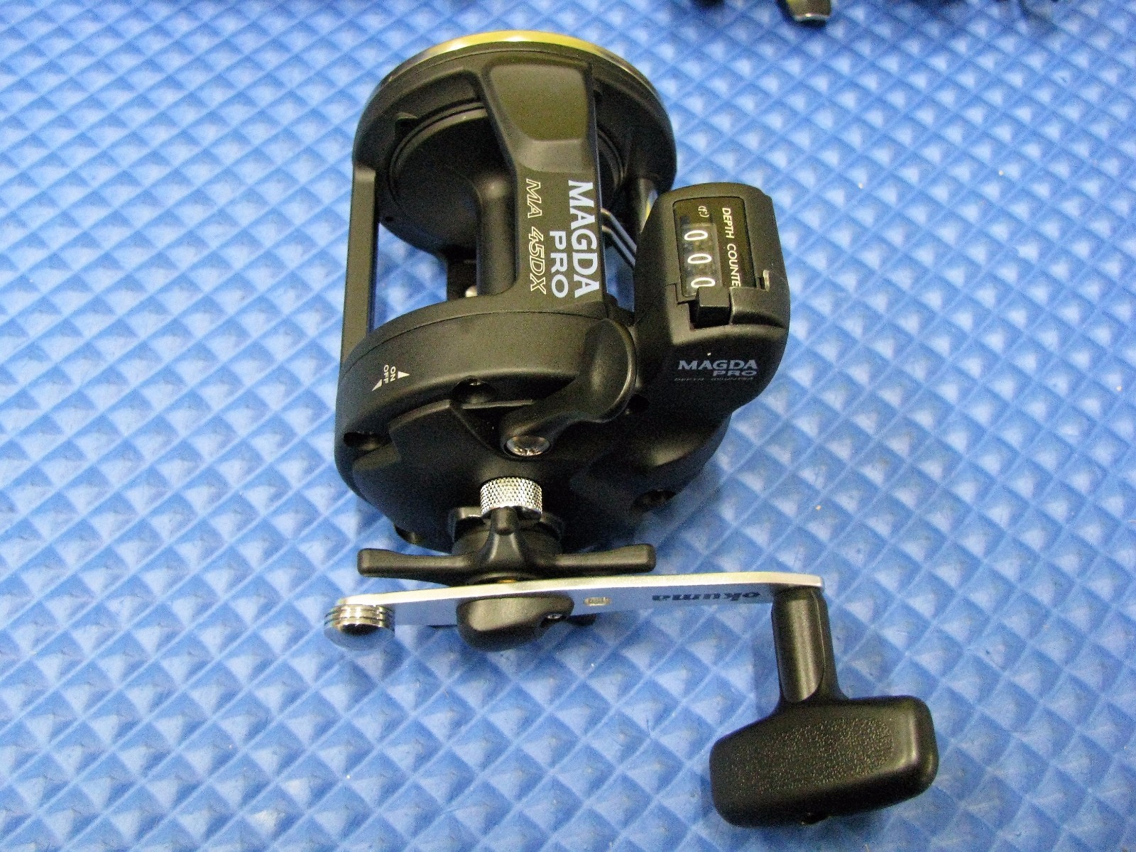 Okuma Magda Pro Line Counter Trolling Reel With Auto Trip MA 45DX 4-PACK