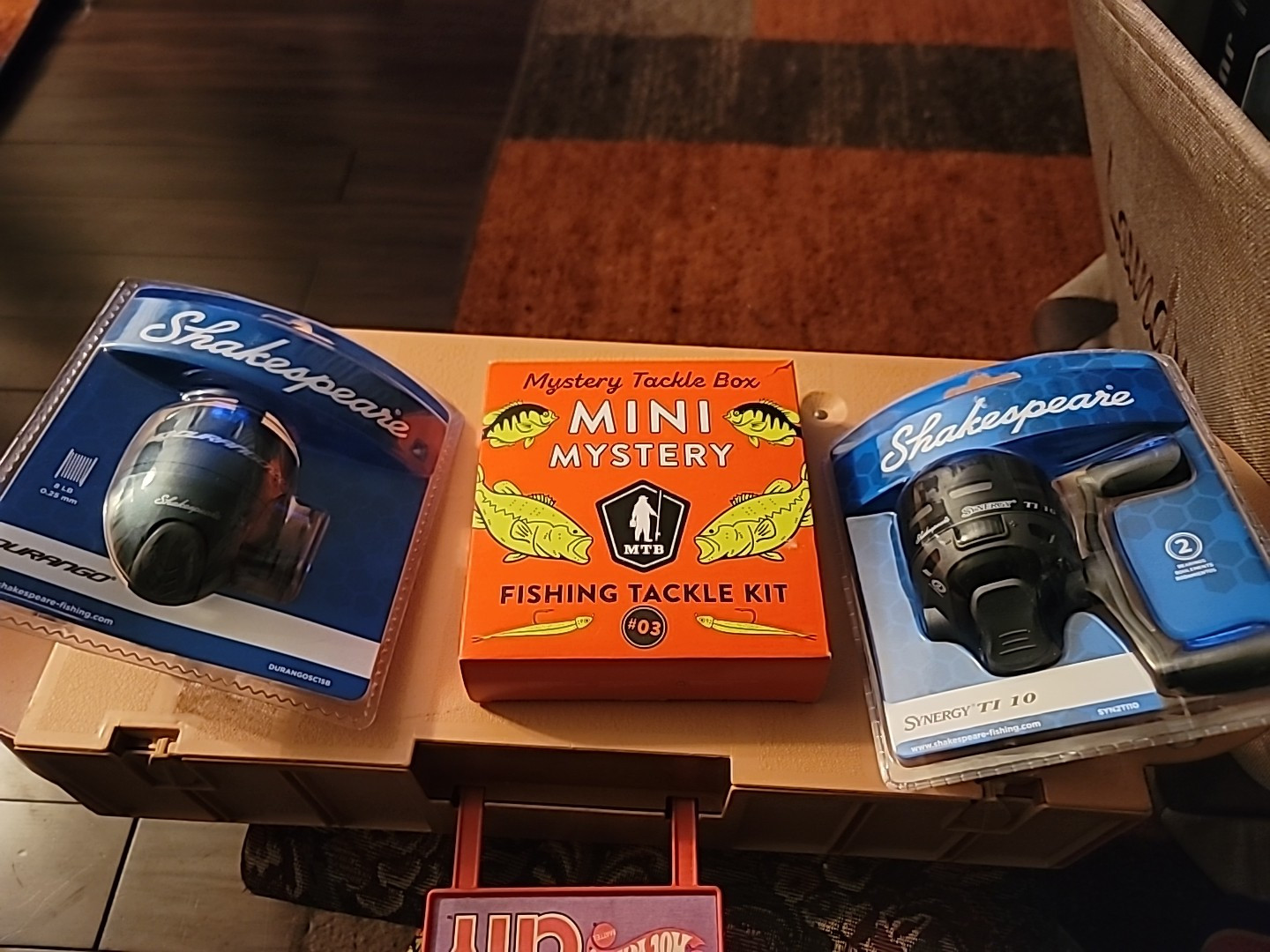 Lot 2 Shakespeare Synergy TI 10 Spincast Fishing Reel And mystery box.