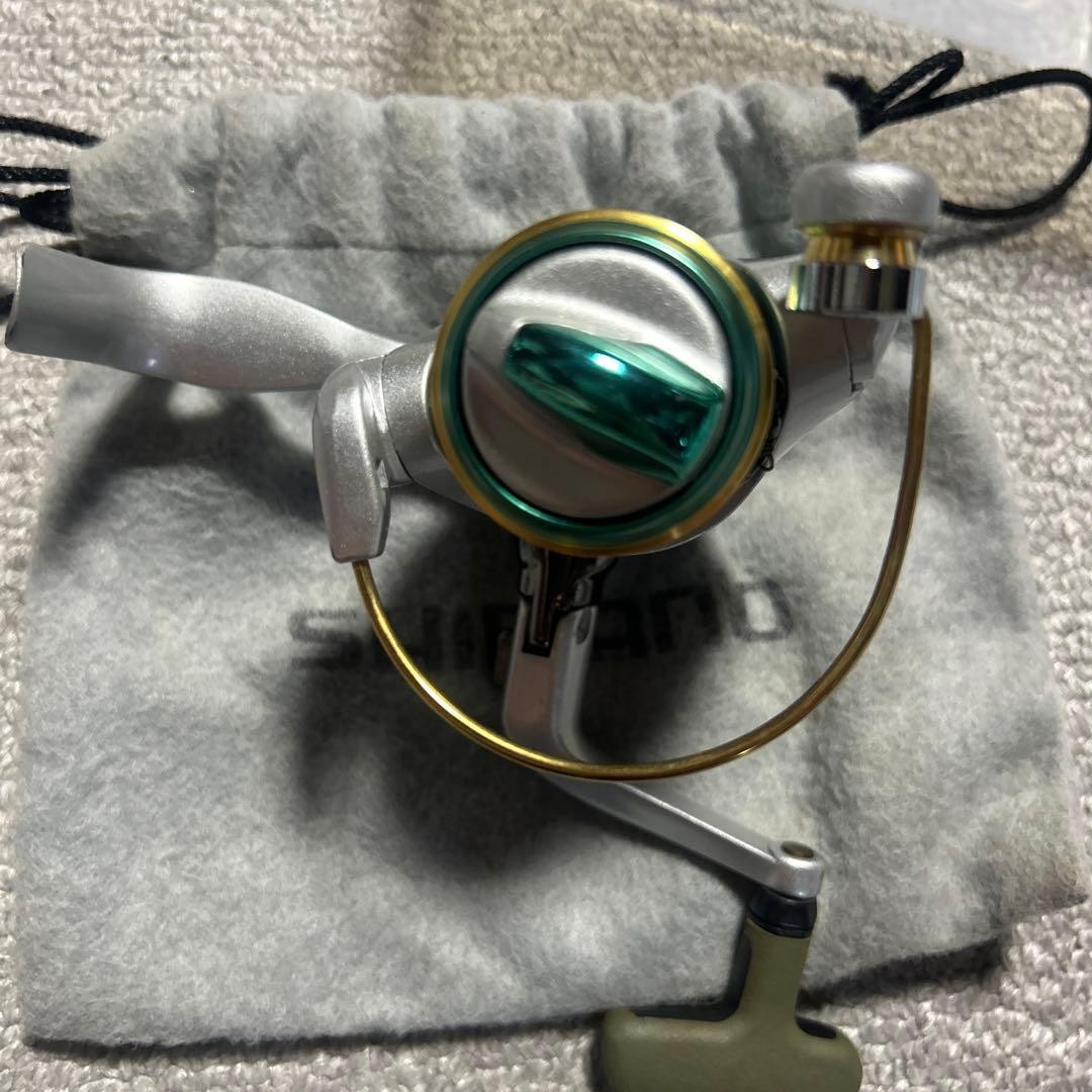 Shimano Fishing Reel Silver Green With Storage Bag