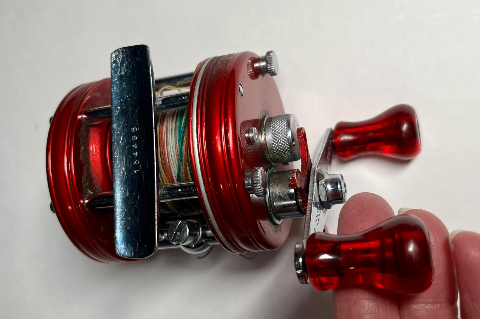 RARE–ABU Garcia Ambassador 5000 Casting Reel, Red w/John Fox Sure Grip Handle