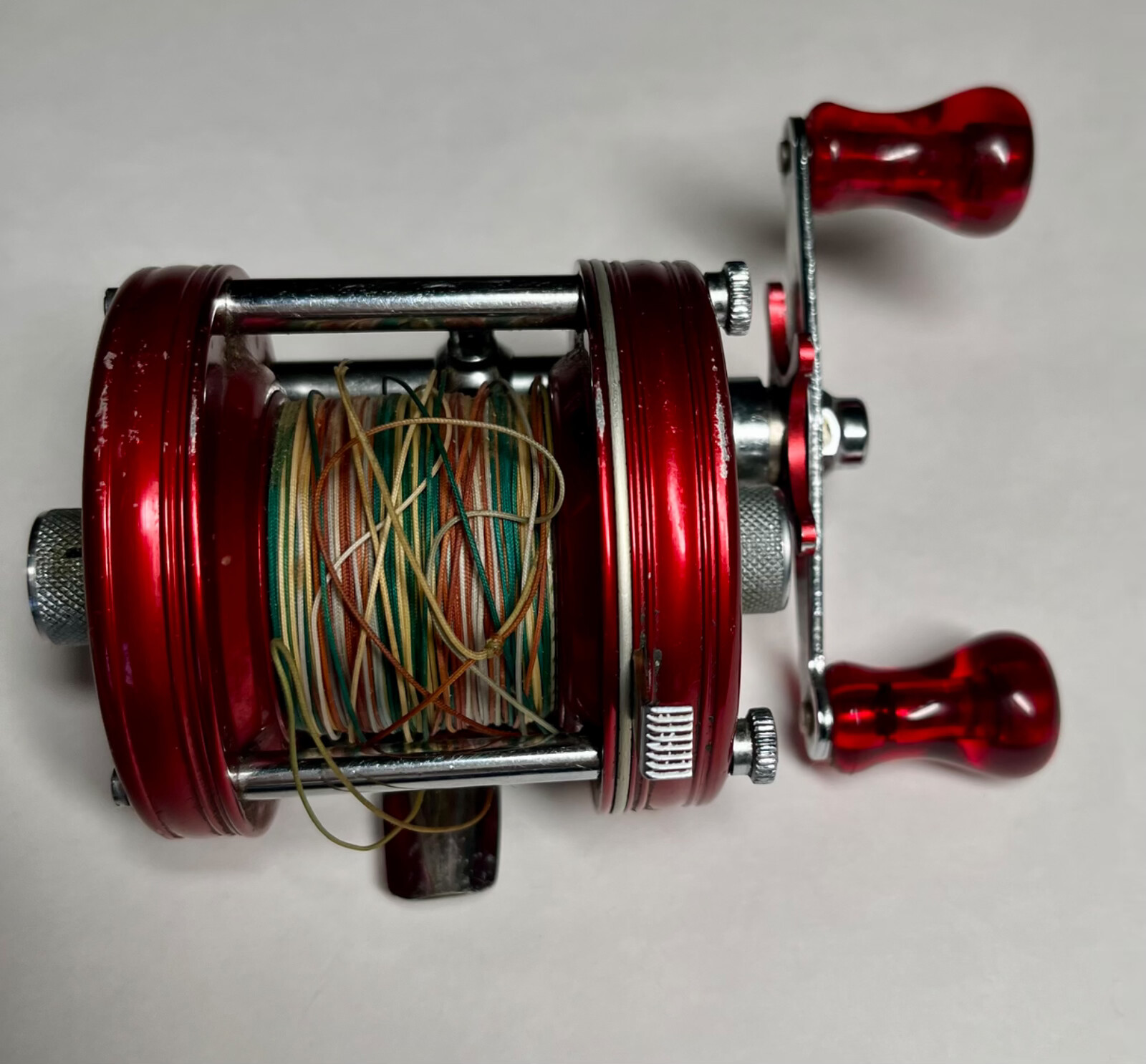 RARE–ABU Garcia Ambassador 5000 Casting Reel, Red w/John Fox Sure Grip Handle