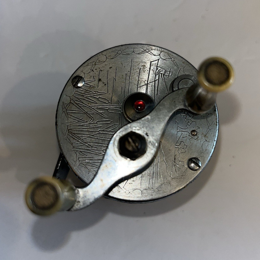Vintage Silver Metal Baitcast Fishing Reel, Round Design, Double Handle Knobs