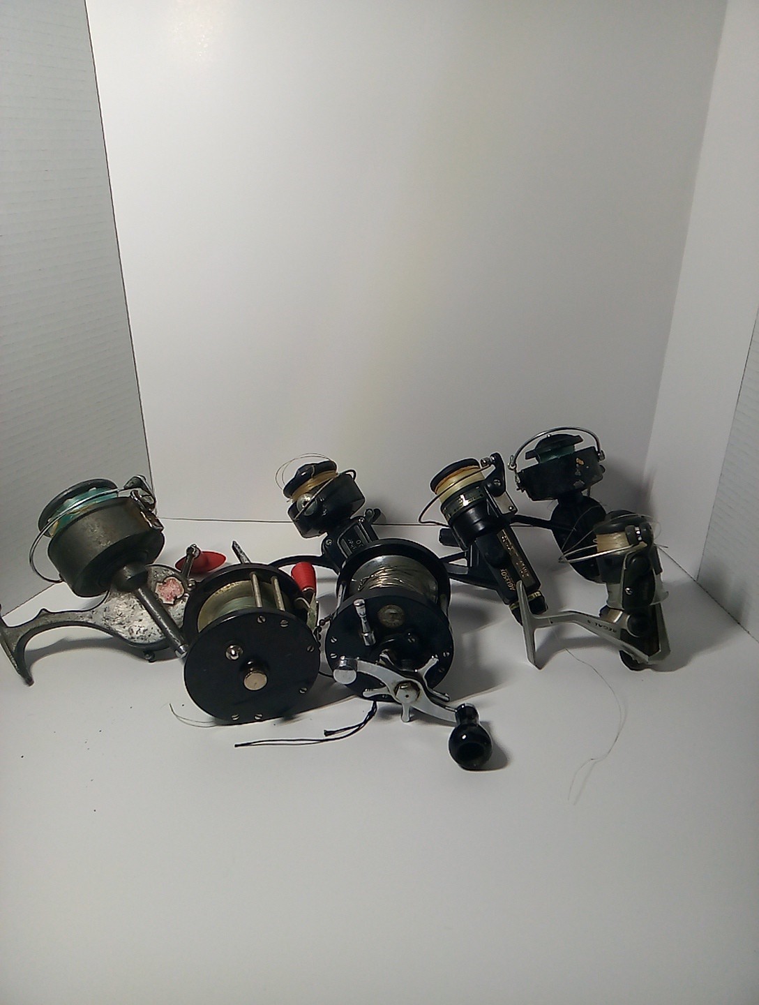 Lot of 7 Fishing Reels Mixed Branded Daiwa Penn MW Black King.