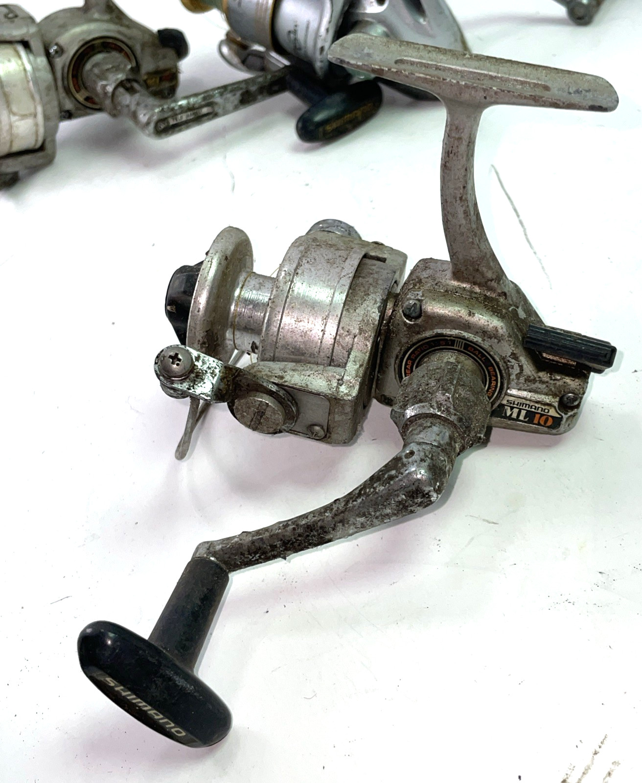 Vintage Lot Of 3 Shimano Spinning Reels ML10, 20, Saros 3000F for parts/repair
