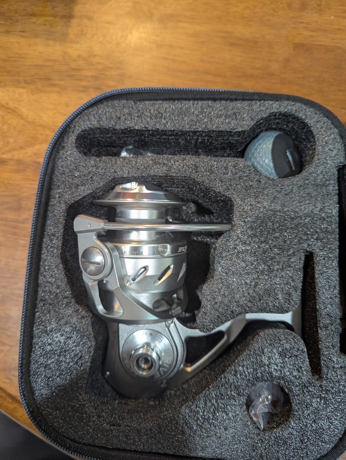 Tsunami SALTX 6000 Spinning Reel 4.7:1 8BB 44lb Drag Silver/Gray Case
