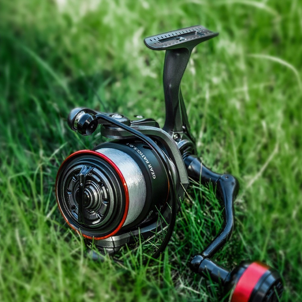 PA66 Composite Body Fishing Reel 12KG Drag CNC Machined Metal Arm Black
