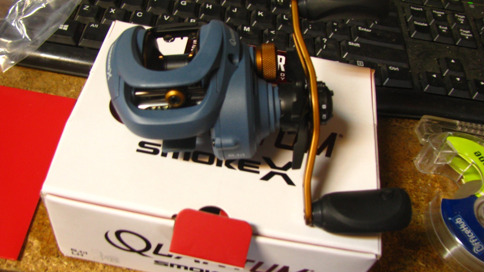 Quantum „smoke“ baitcast reel, SMX101SPT, nib, LH, free shipping