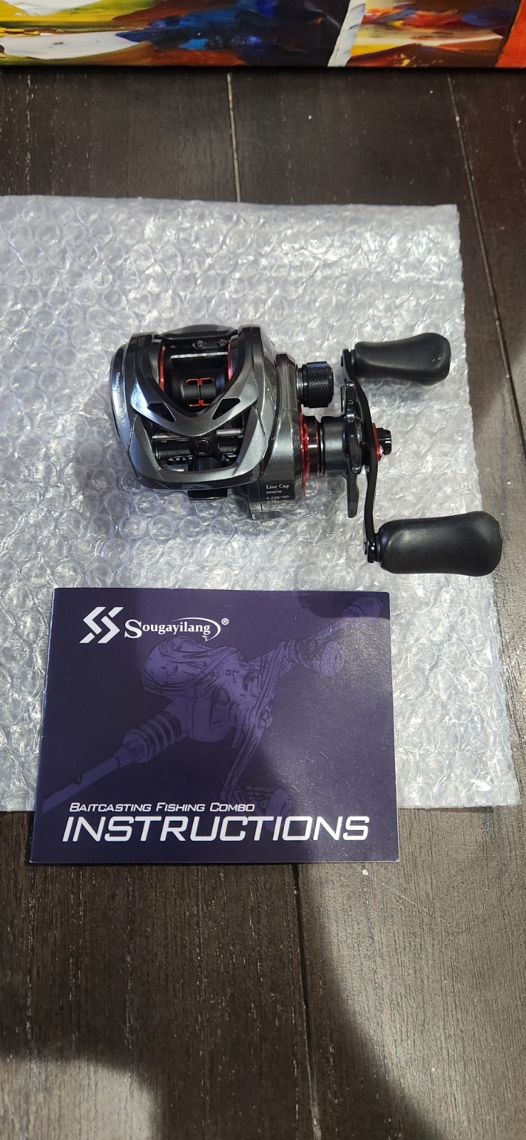 Left Handle Sougayilang Baitcasting Fishing Reel Dark Grey And Red Good Quality
