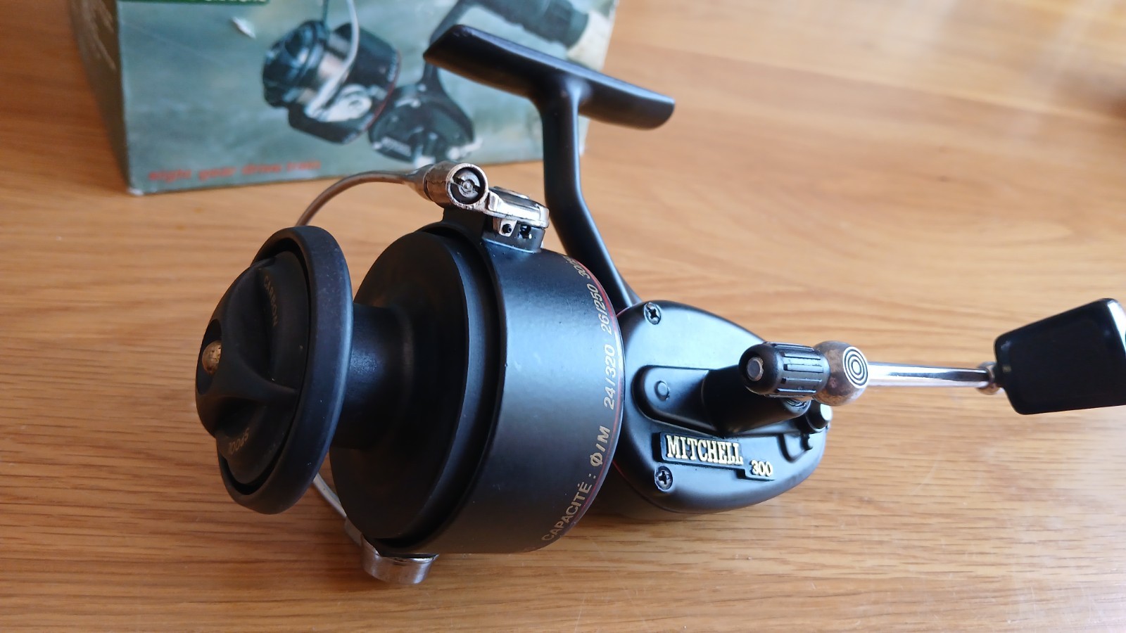 A very good boxed Mitchell 300 Fishing reel 2 spools, spoolpot & paperwork.