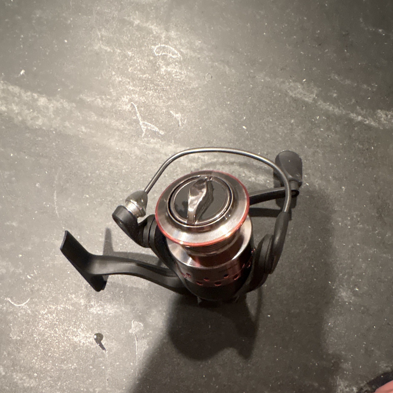 Shakespeare Spinning Reel Right-Hand Retrieve Front Drag Black/Red