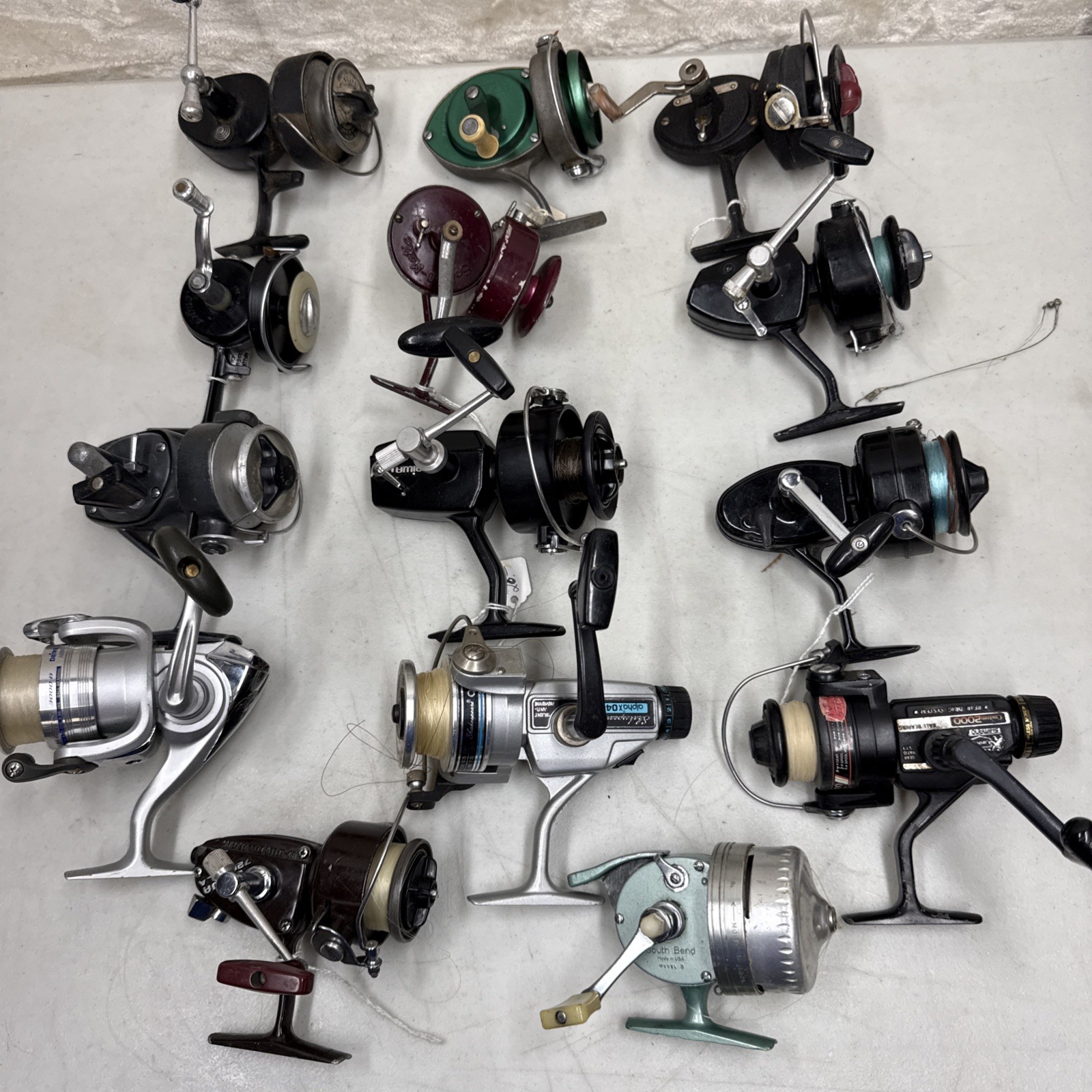 Lot Of 14 Shimano, Daiwa,Pflueger, Shakespeare,South bend Fishing Reels Untested