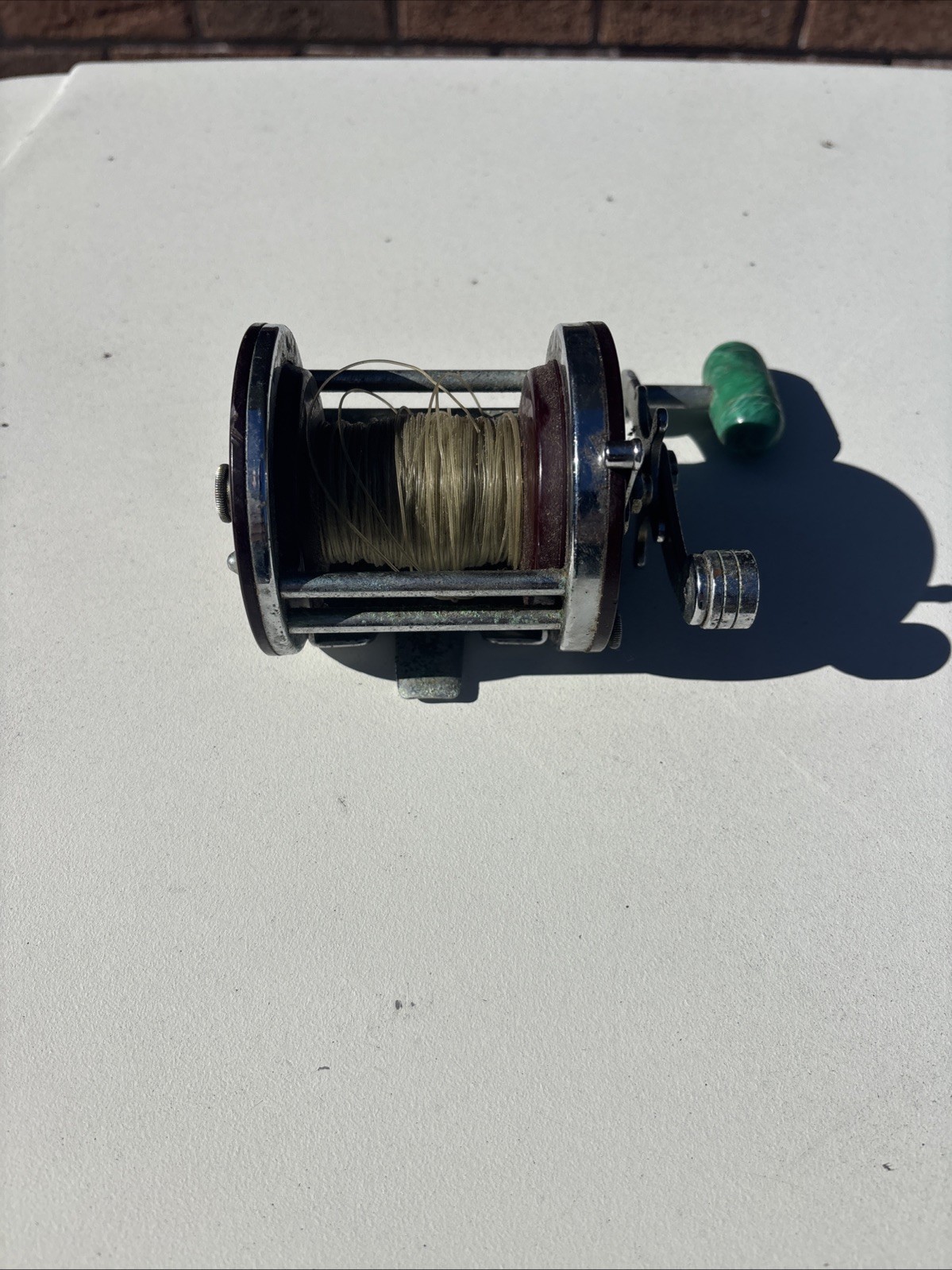 Penn Jigmaster 500 Conventional Vintage Fishing Reel Red Silver Green Handle