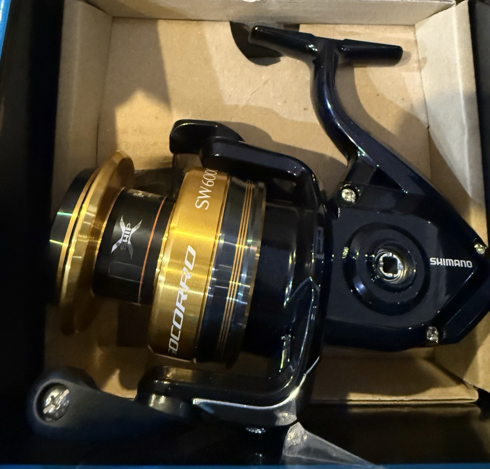 Shimano Socorro SW6000 6000 Spinning Reel 4.9:1 22lb 4+1 BB Black/Gold