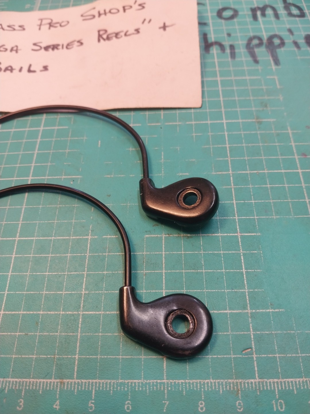 Older Bass Pro Shop Mega Series’s Reel Wire Bails New