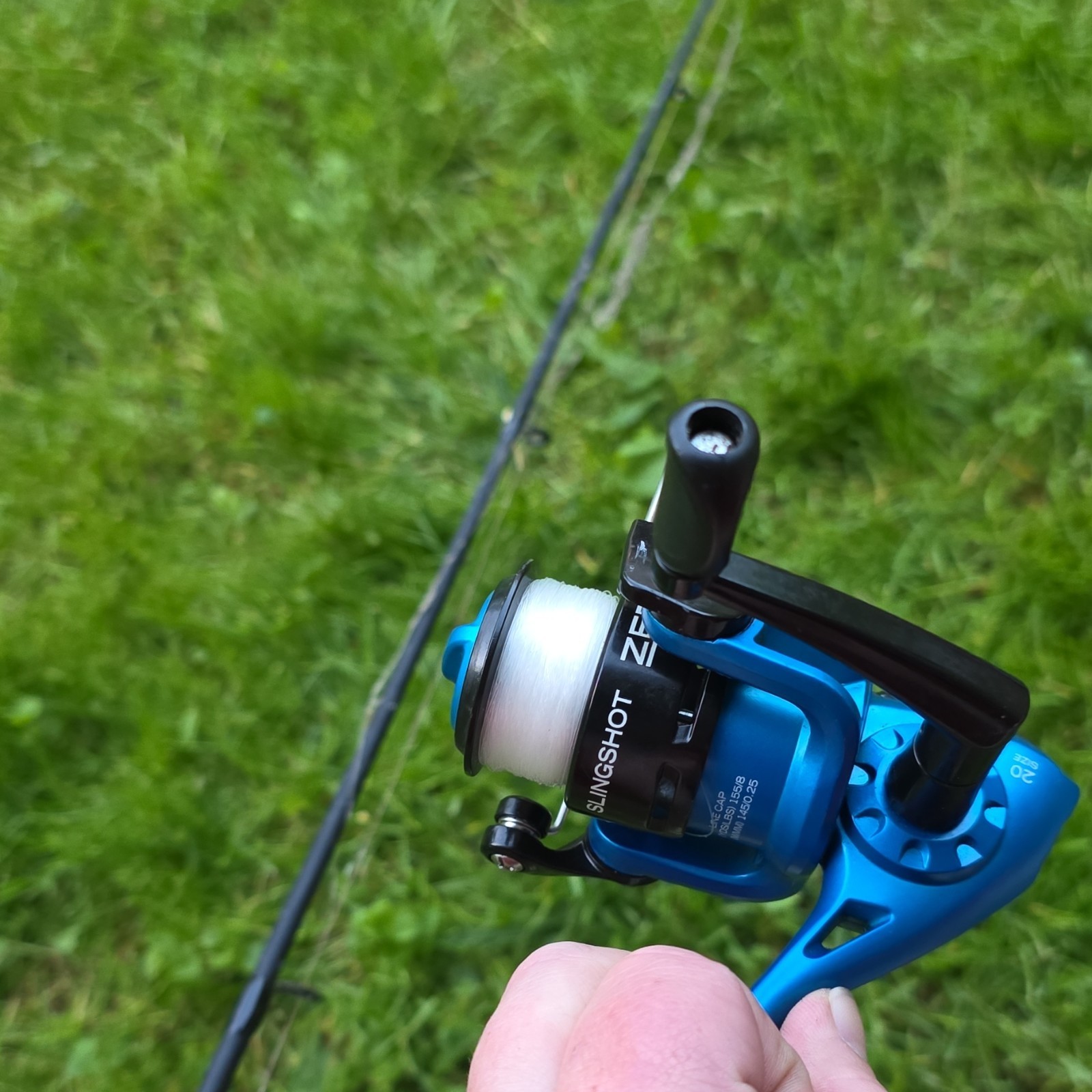 Zebco Slingshot Spinning Reel Blue Black Pre-Spooled 155 yd/8 lb Line