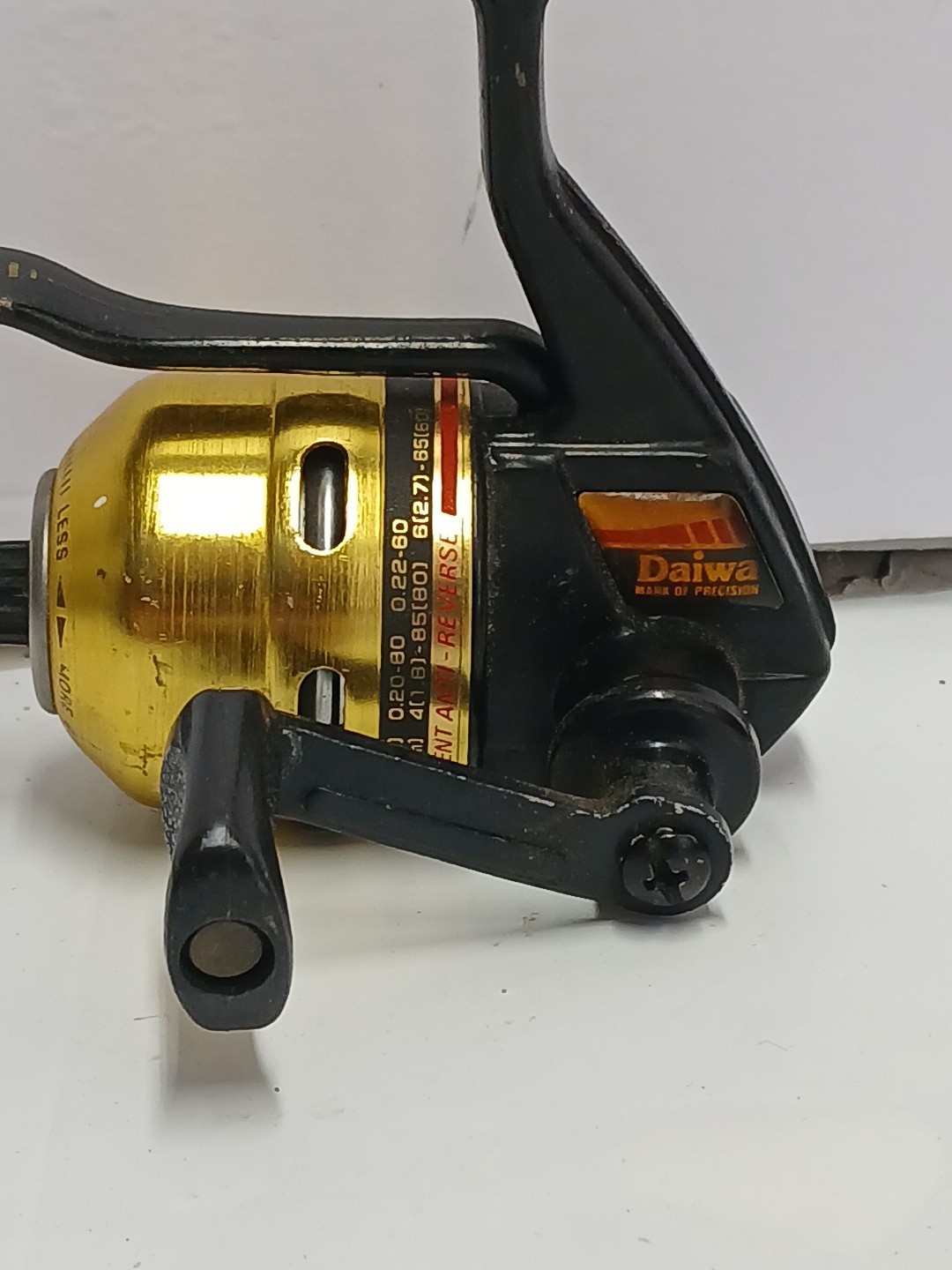 Vintage Gold Daiwa Us40 Reel -Mark Of Precision underspin trigger cast Reel