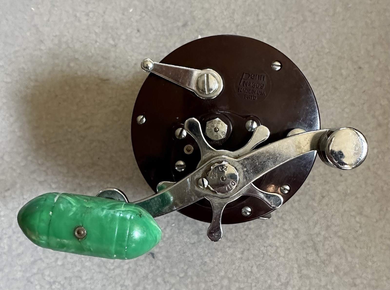 Penn 309 Super Peer Level Wind fishing reel Stainless steel Bakelite 1960’s EXC