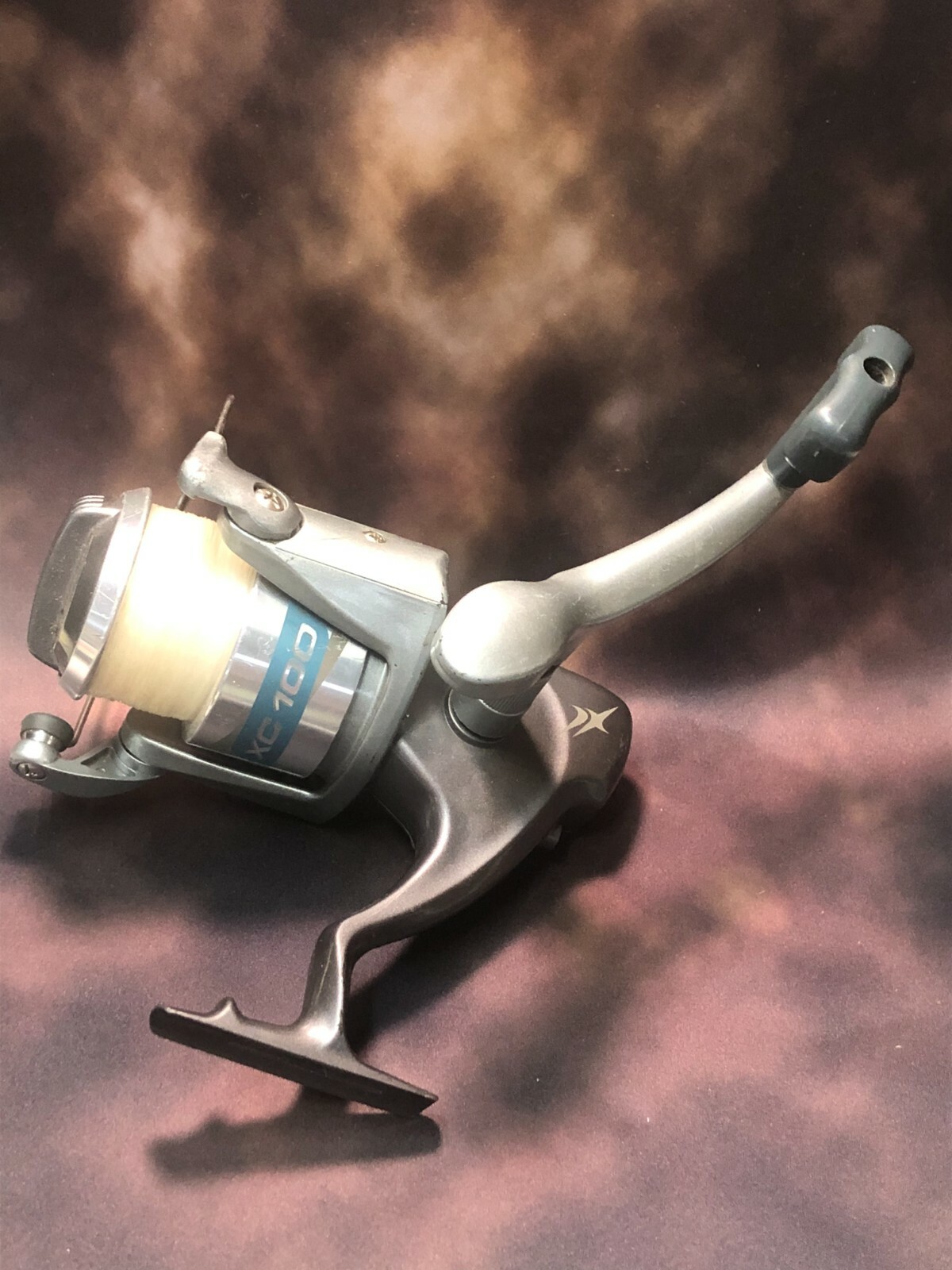 South Bend XC100-70B Heavy Freshwater Fishing Reel Used Silver/Grey