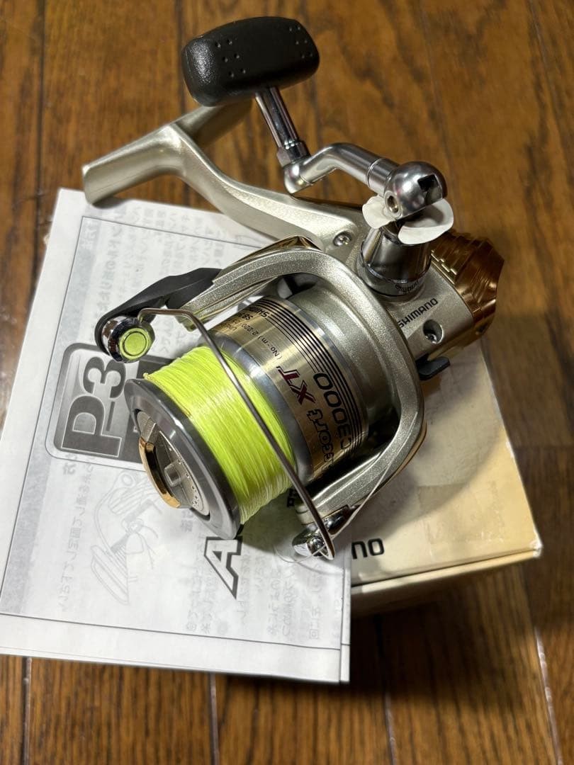 Shimano Accort XT C3000 Spinning Reel Gold PE Line & Leader Included Used