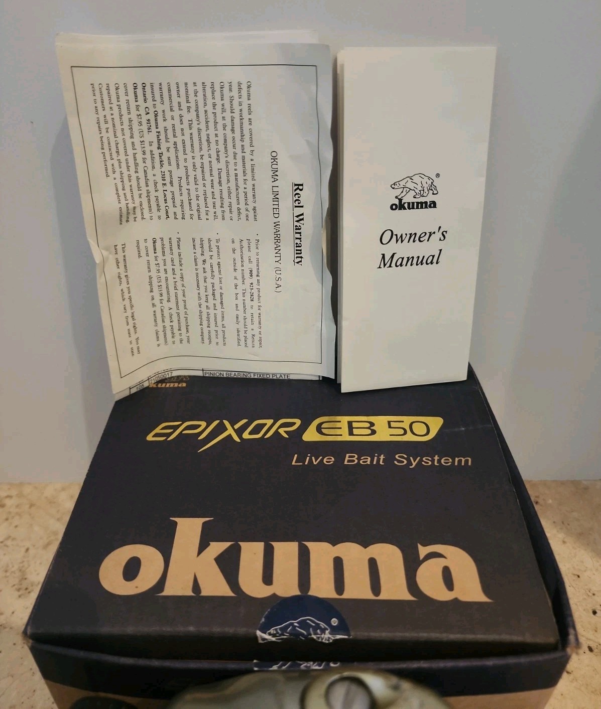 Okuma EPIXOR EB50 Live Bait System Reel In Box With Paper Work