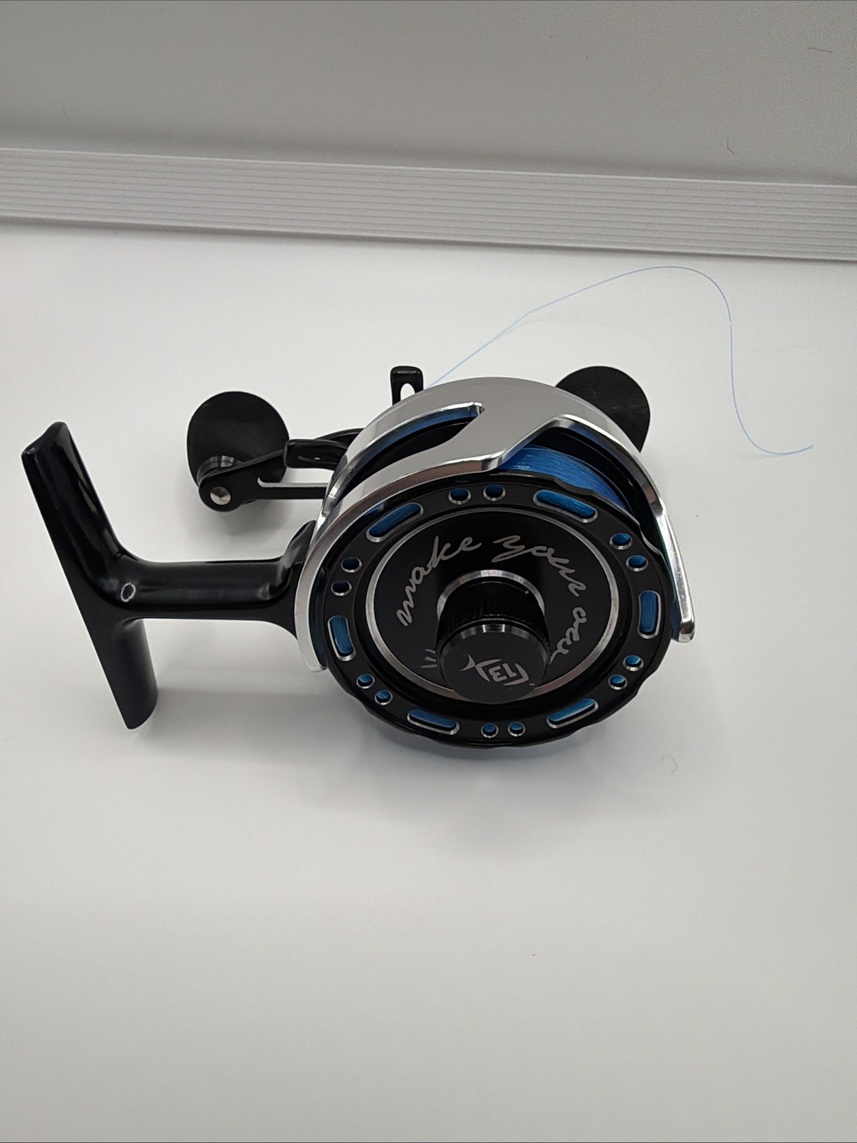 13 Fishing Black Betty 6061 Ice Fishing Reel Inline Silver Black Left Hand Hunt