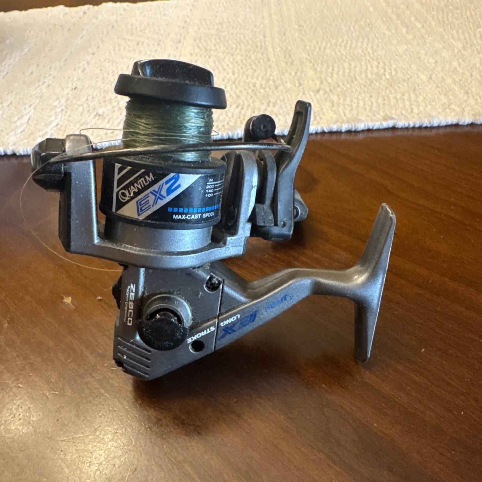 Quantum EX2 Fishing Reel Long Stroke Zebco Max-Cast 1991 Vintage Snapshot