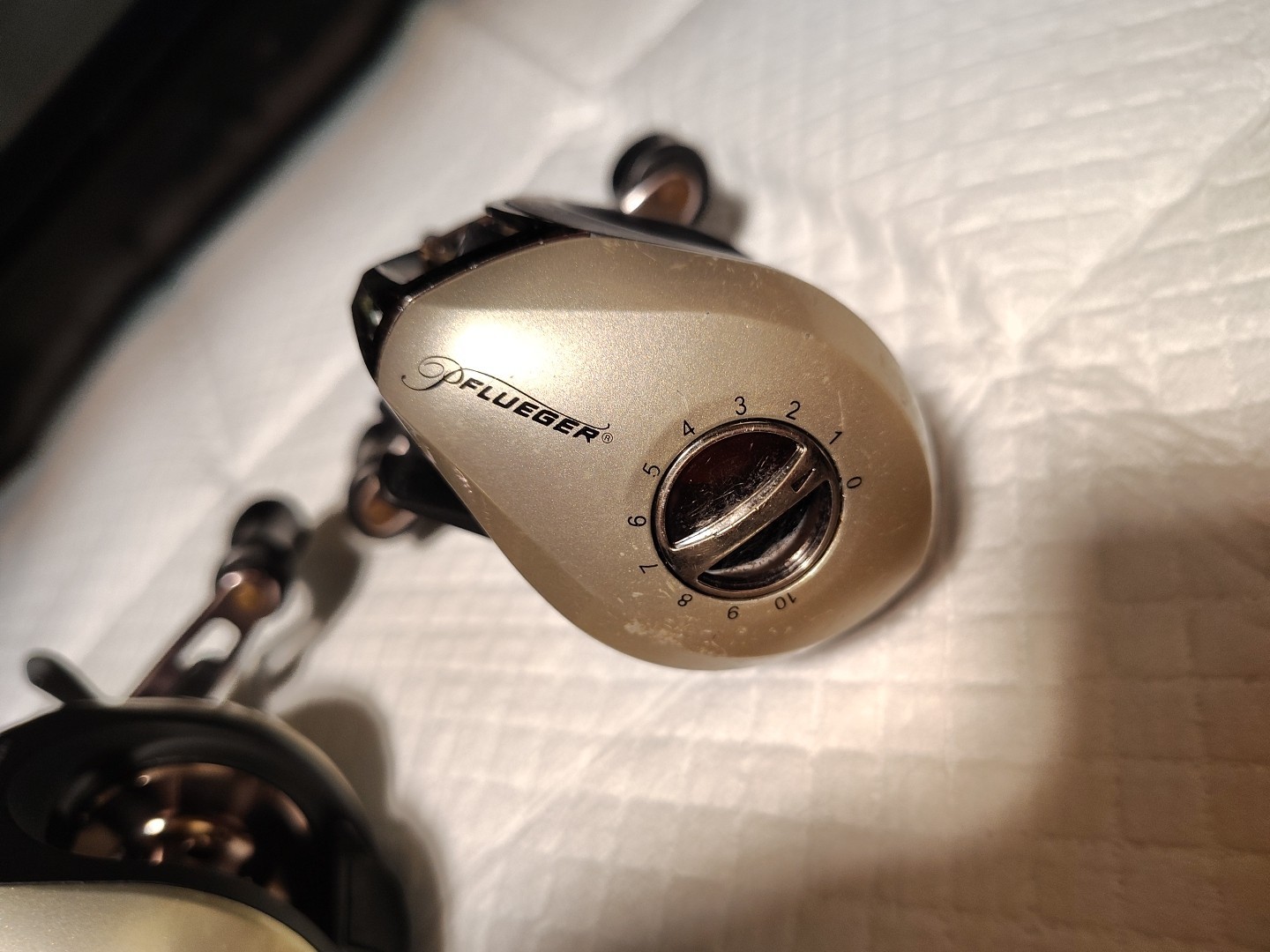 (2) PFLUGER ( TRION ) BAITCASTING REELS # TRI62LP/ SEE PHOTOS