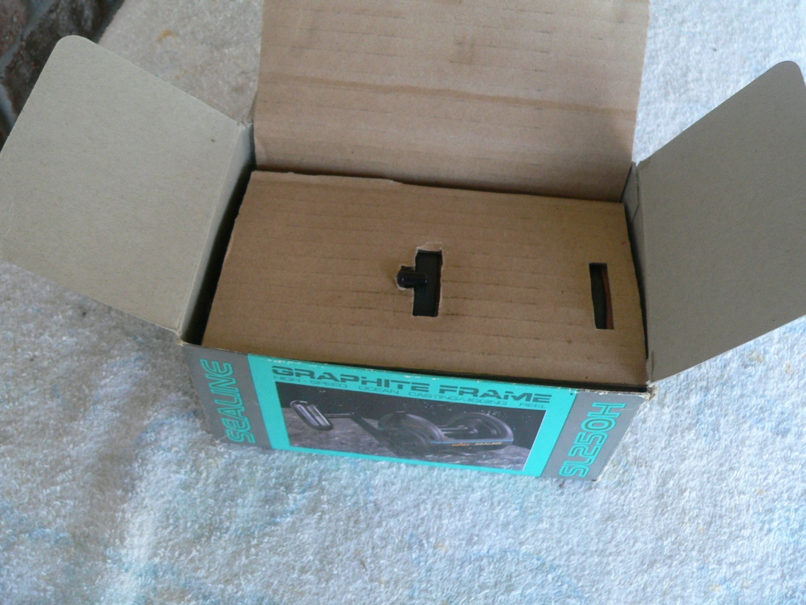 brand new dawia sealine sl 250h reel never used with box and paperwork