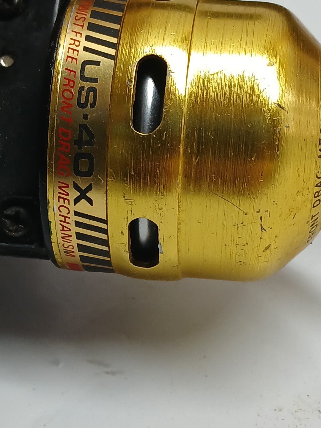 Vintage Gold Daiwa Us40 Reel -Mark Of Precision underspin trigger cast Reel