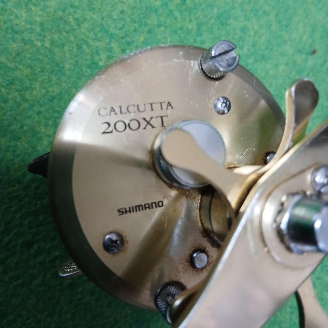 [Used] SHIMANO CALCUTTA 200XT Gold Double Handle Baitcasting Reel – From JAPAN