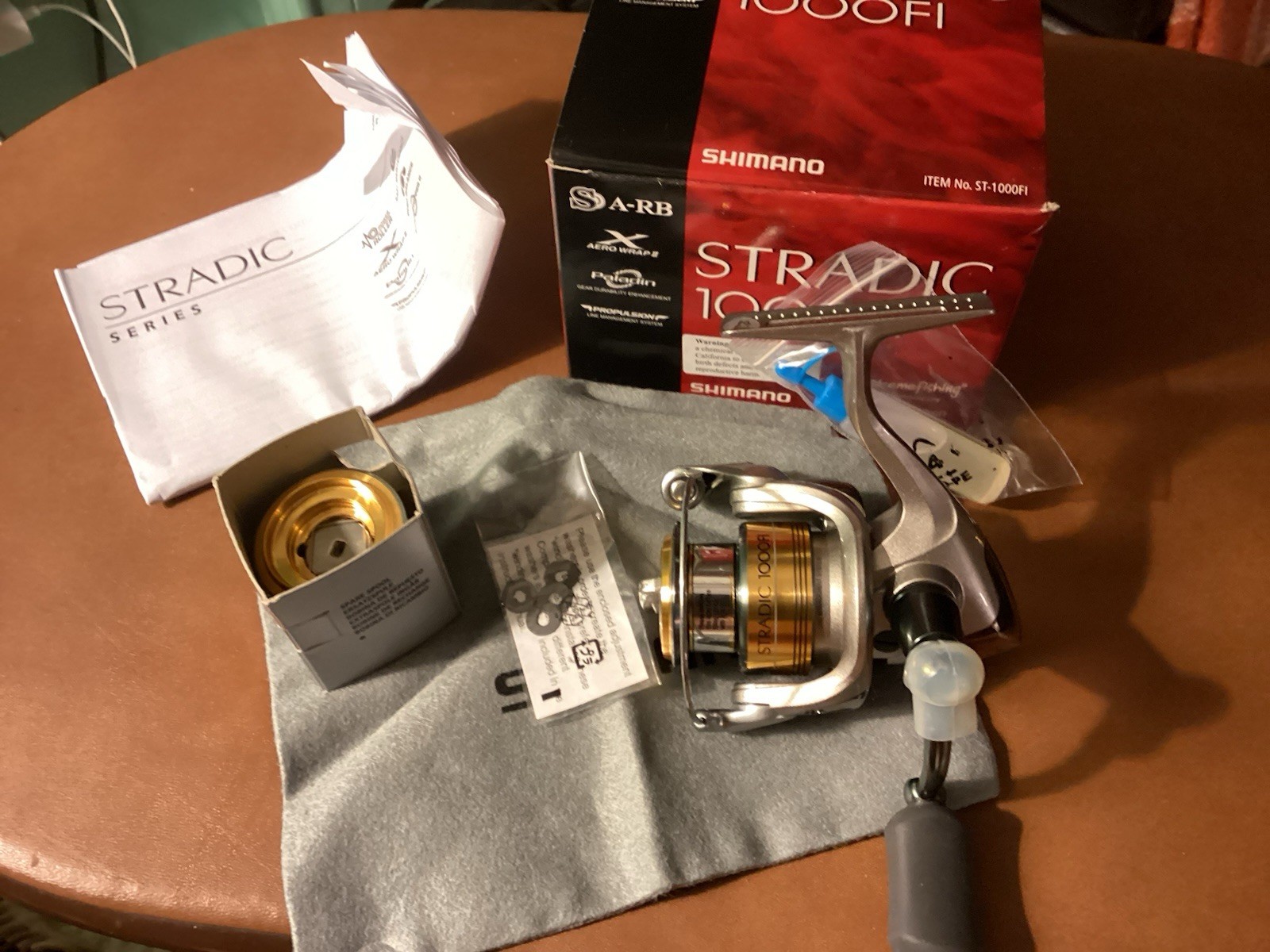 Shimano Stradic 1000FI New In Box With Xtra Spool Bag And Oiler.