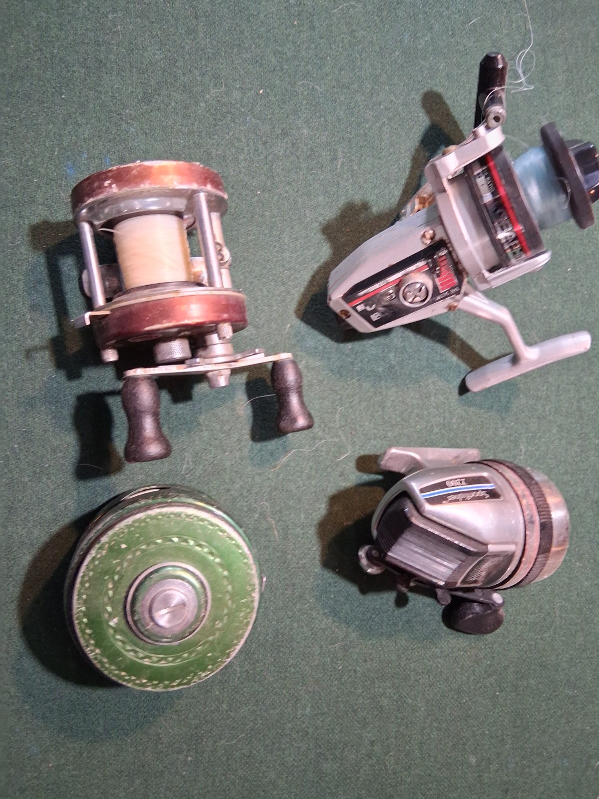 LOT OF 4 fishing reels*vintage * trolling reels * fly reel*spincaster