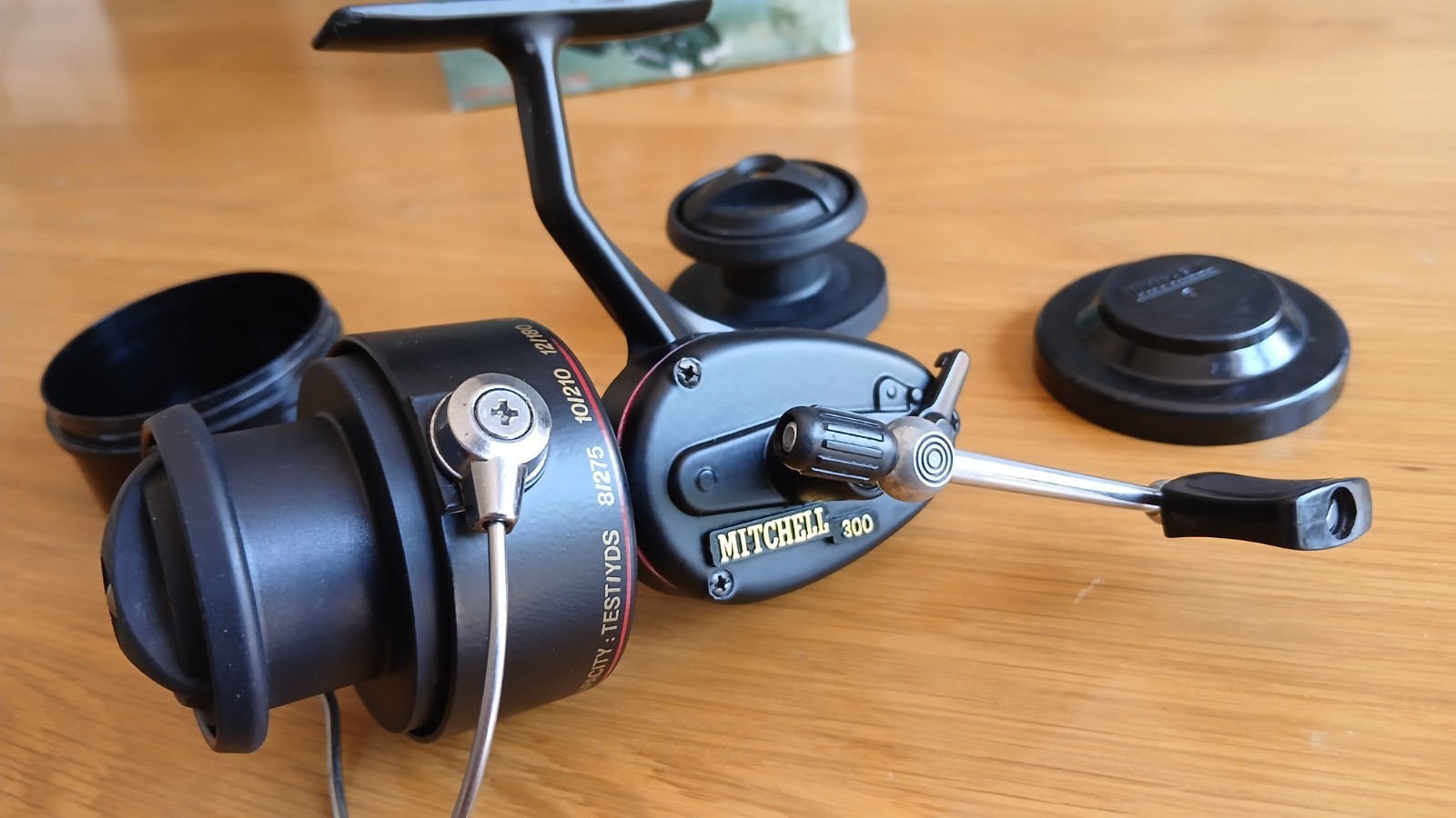 A very good boxed Mitchell 300 Fishing reel 2 spools, spoolpot & paperwork.