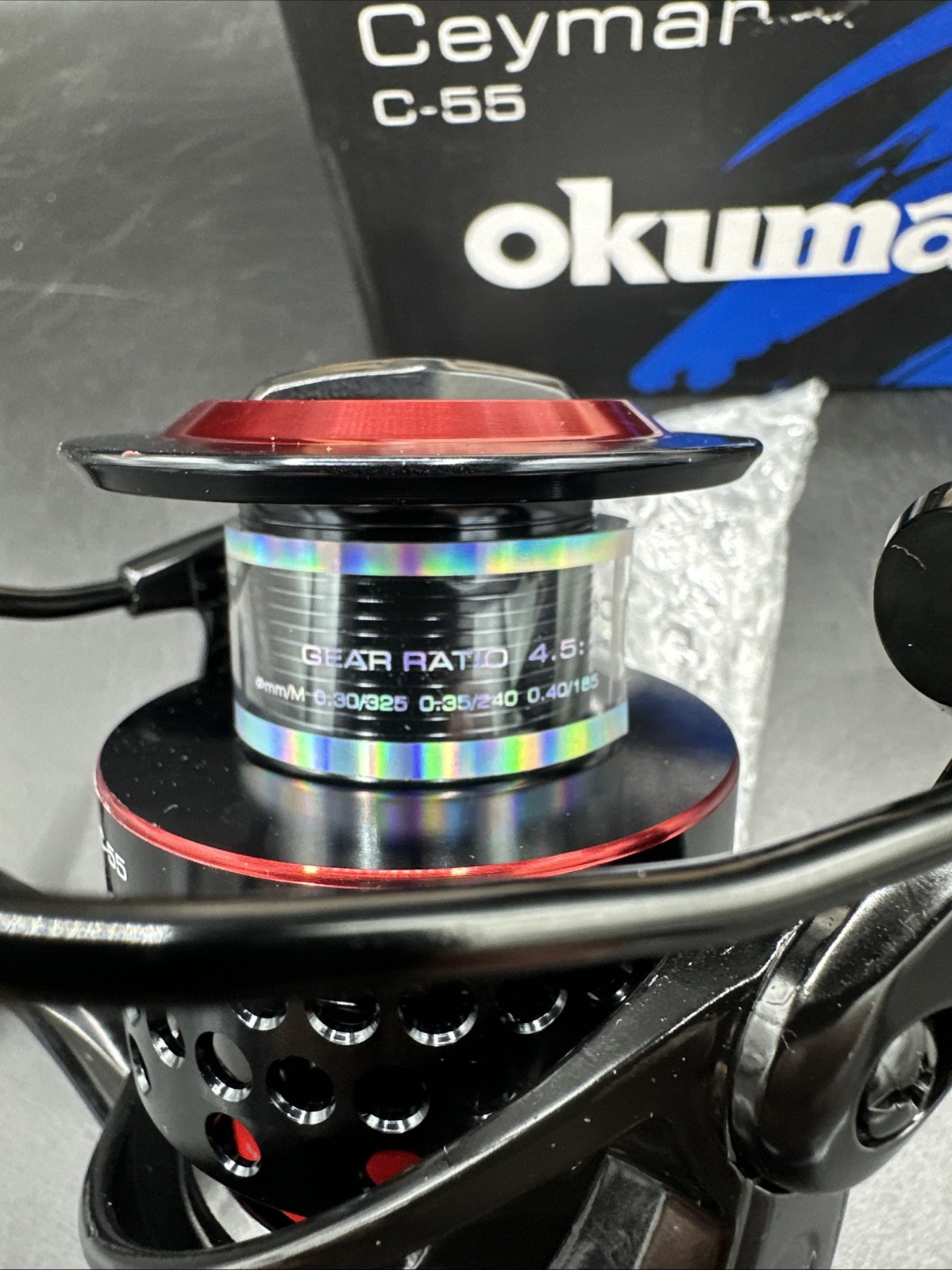 Brand New (open box) Okuma Ceymar Lightweight Spinning Reel- C-55, Black/Red