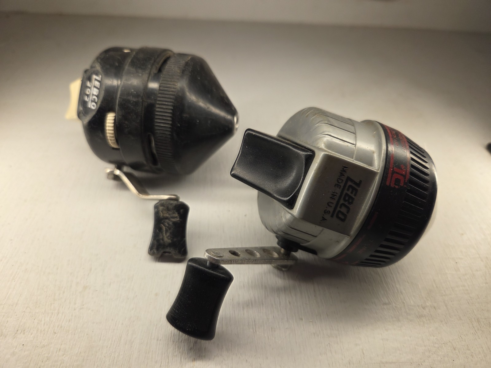 2 Vintage Zebco Fishing Reels 202 101 Spincast Metal Feet USA
