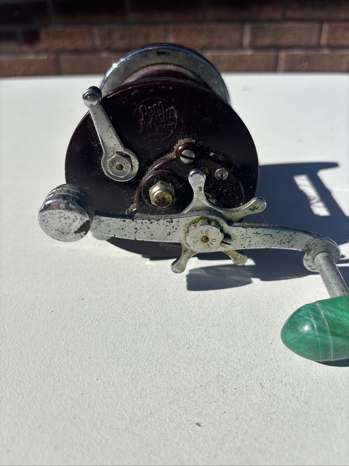 Penn Jigmaster 500 Conventional Vintage Fishing Reel Red Silver Green Handle