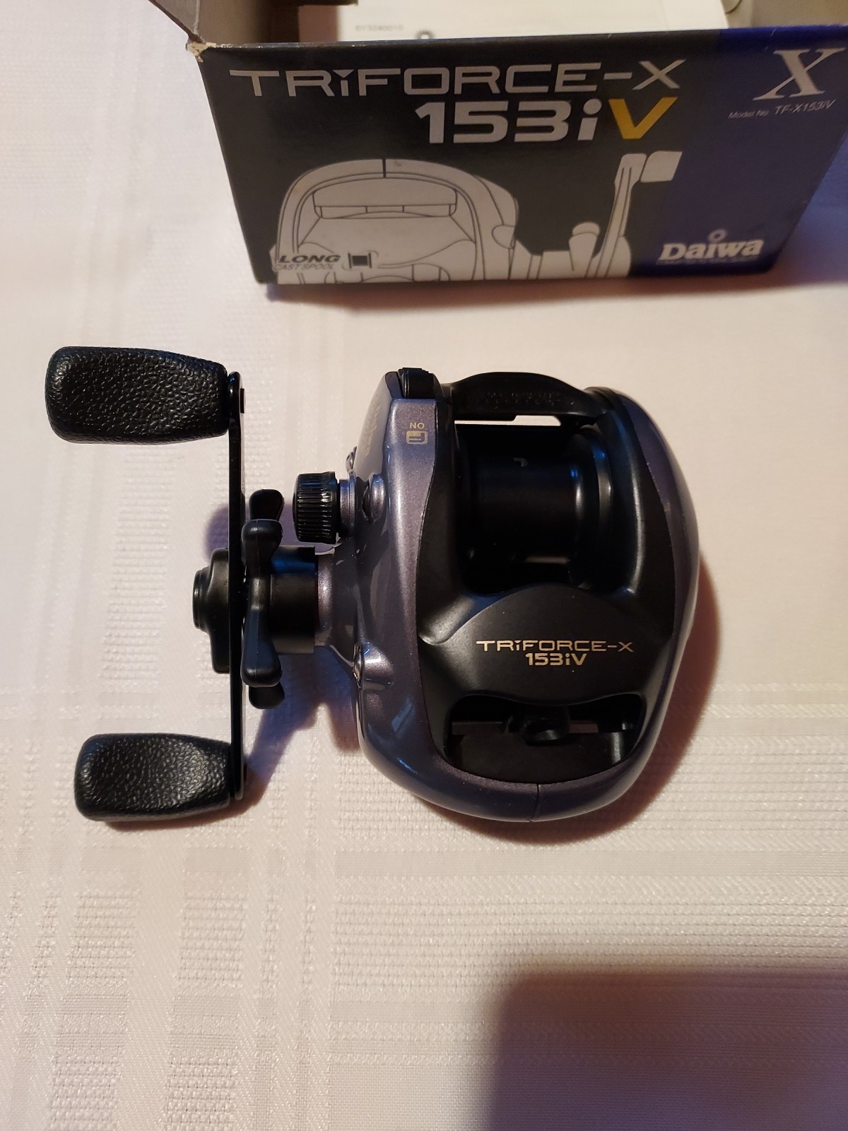 Reel Triforce-x 153iV By DAIWA, model#TF-X153iV, Thailand, New In Box