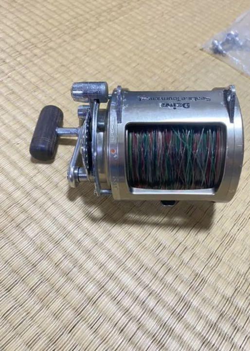 Daiwa Tournament SLT50W / fishing /Reel / scratches and stains /japan