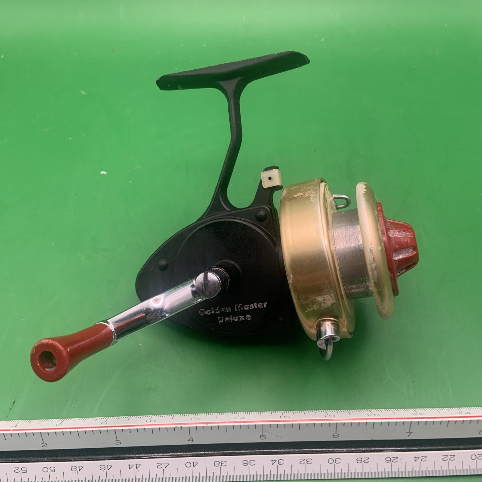 Unusual Vintage Fishing Reel Golden Master Deluxe Mid Century Black Gold