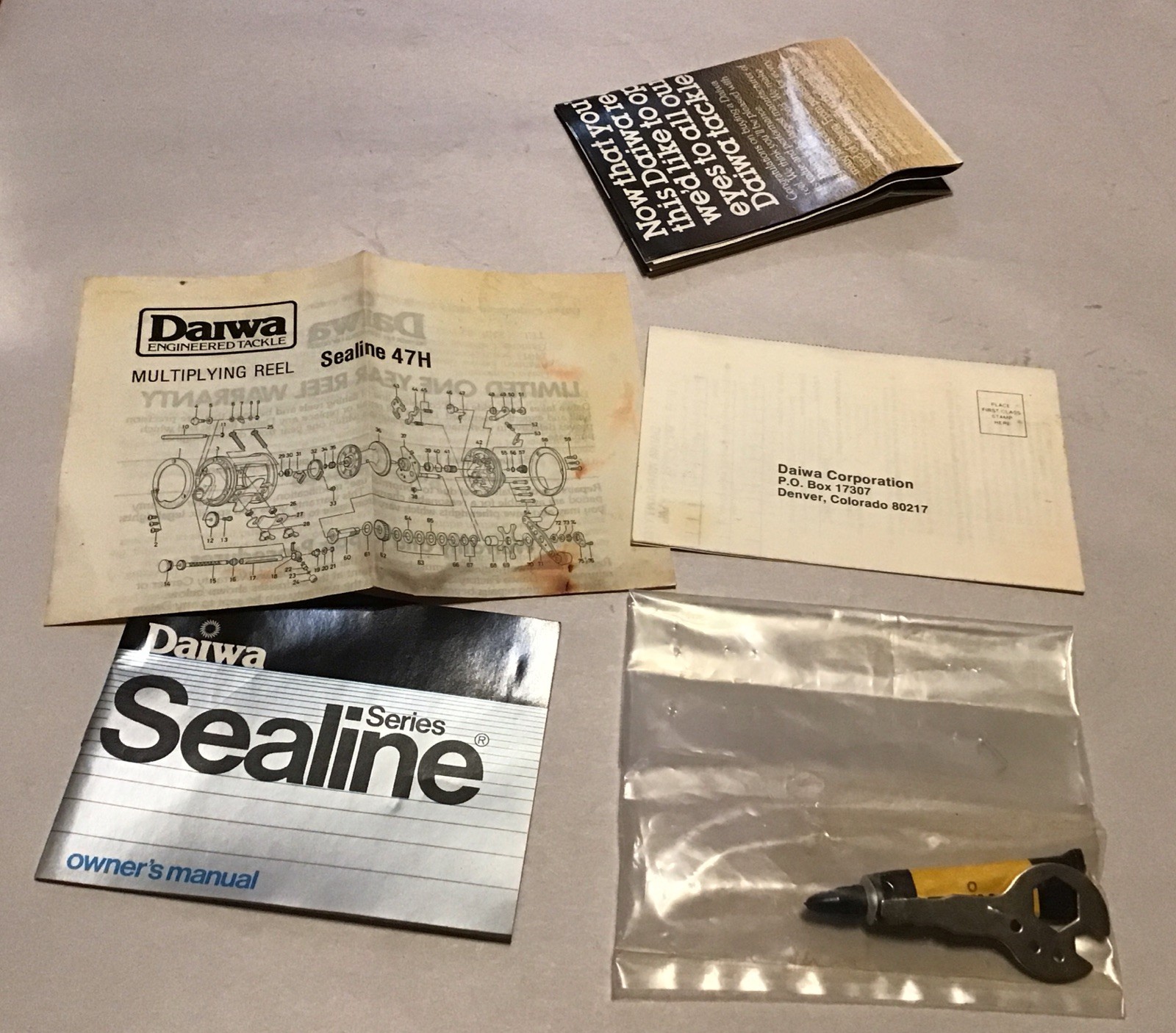 Daiwa Sealine 47H Fishing Reel, rod clamps, tools, Lube,Manual & Original Box