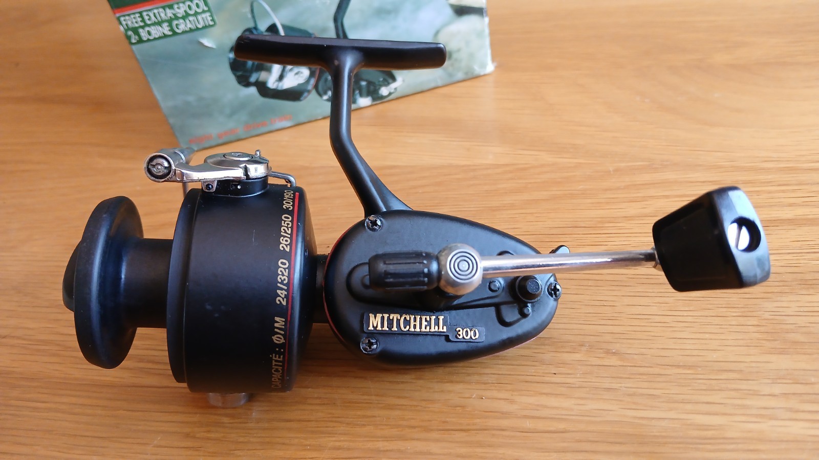 A very good boxed Mitchell 300 Fishing reel 2 spools, spoolpot & paperwork.