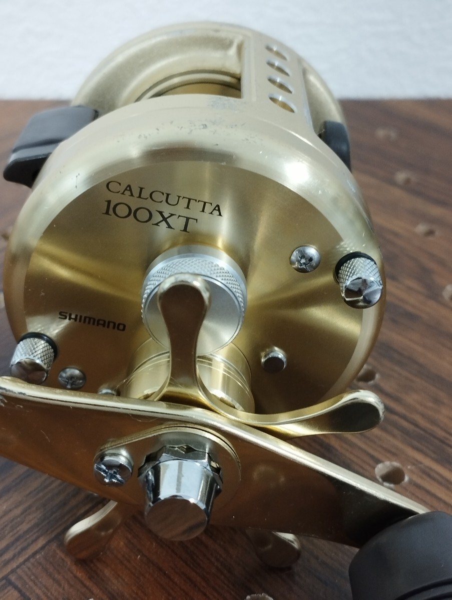Shimano Calcutta 100XT Baitcasting Reel Minor Scratches Smooth Operation
