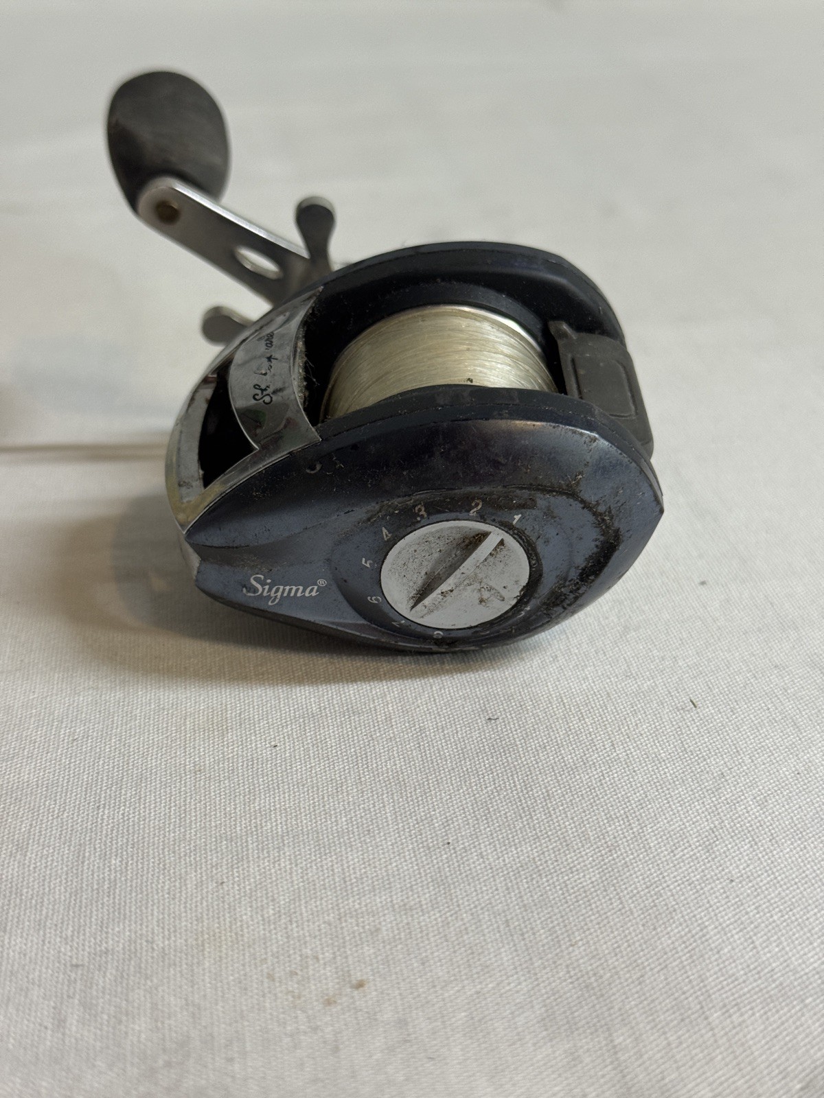Shakespeare Sigma spinning reel fishing used