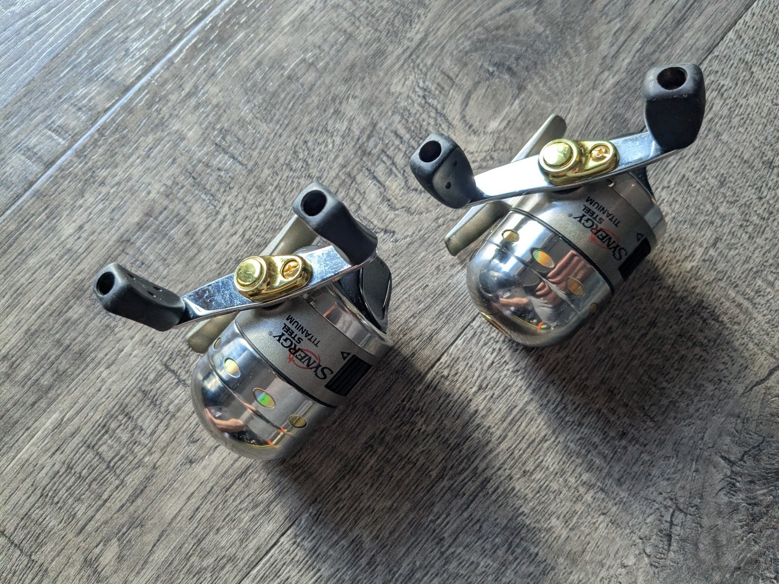 Lot of 2 Small Shakespeare SYNERGY Steel Titanium Model SYMC Casting Reels NICE