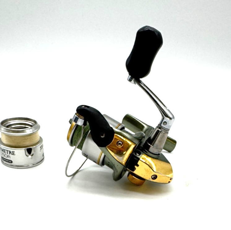 Shimano Symetre 750FI Fishing Reel Used Good Condition with Spare Spool