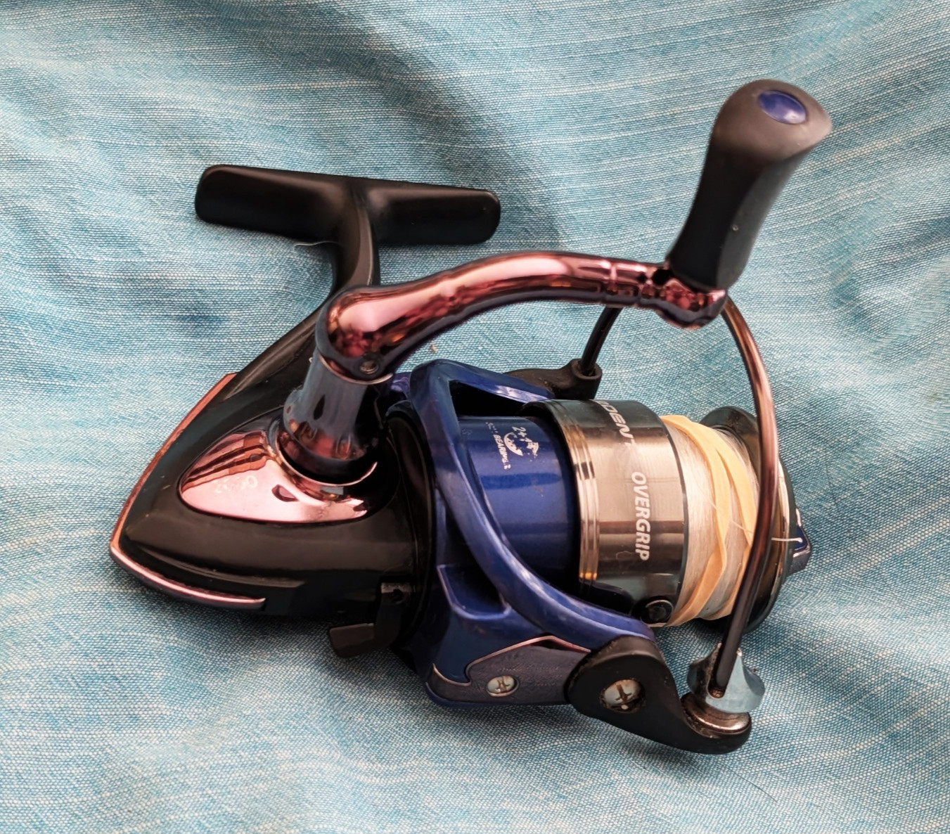 PRE-OWNED ARDENT 2000 OVERGRIP HIGH-SPEED PERFORMANCE SPINNING REEL 6.2:1