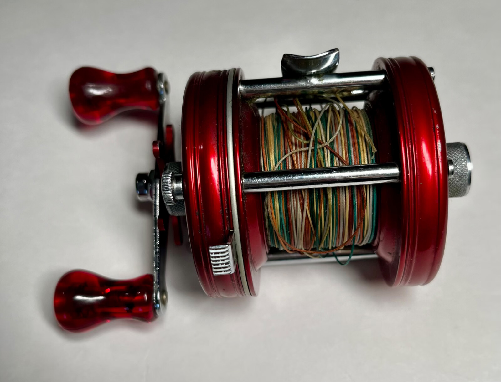 RARE–ABU Garcia Ambassador 5000 Casting Reel, Red w/John Fox Sure Grip Handle