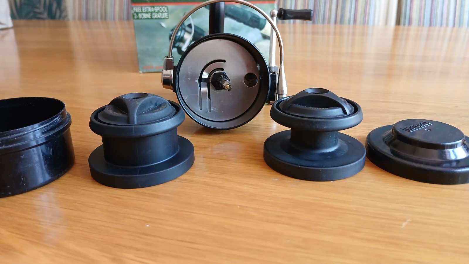 A very good boxed Mitchell 300 Fishing reel 2 spools, spoolpot & paperwork.